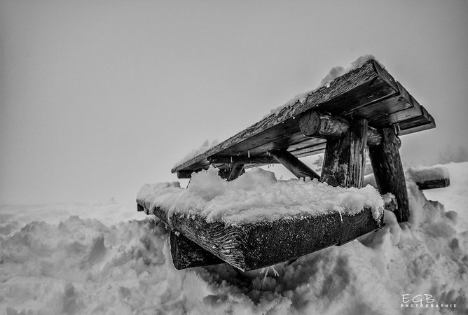 a-cold-wooden-bench